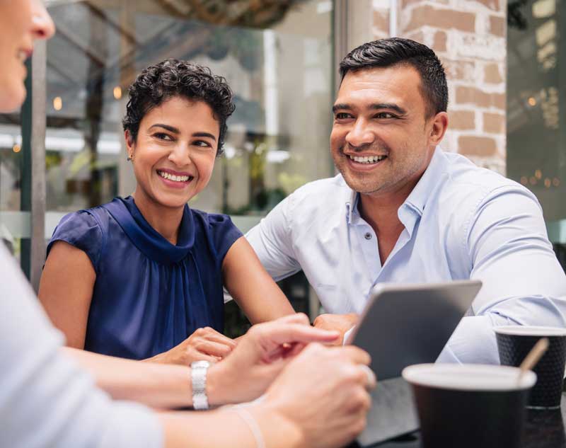 Image of couple meeting with consultant